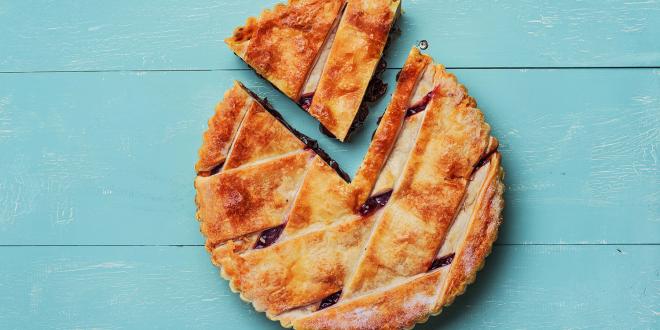 gluten-free cherry pie on blue wood background
