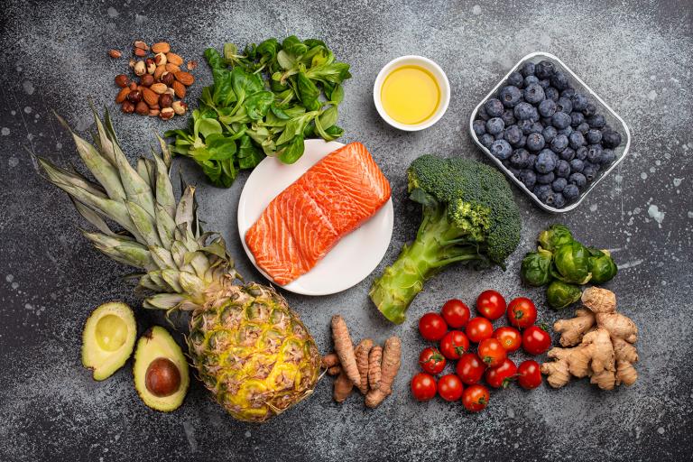 anti-inflammatory foods such as avocado, pineapple, salmon, ginger, and blueberries